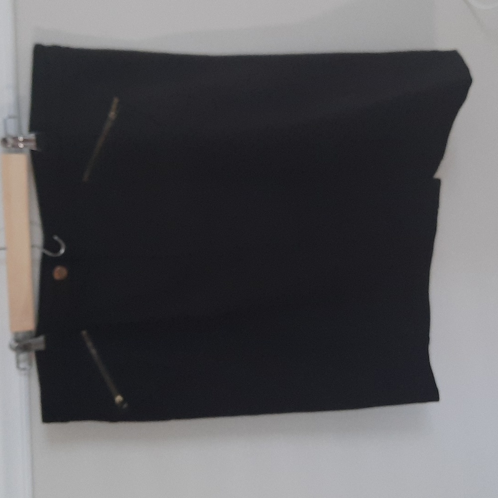 Black skirt with gold button and zipper accents